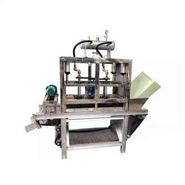 Stroj na loupání česneku